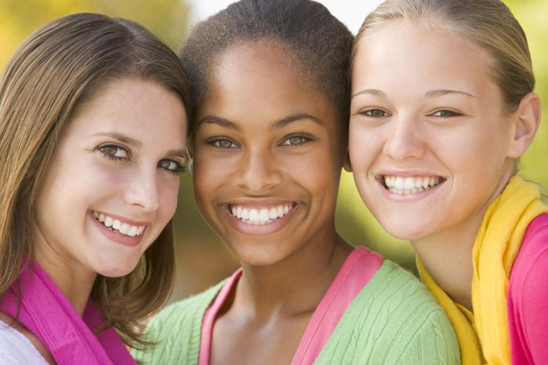 People smiling with braces